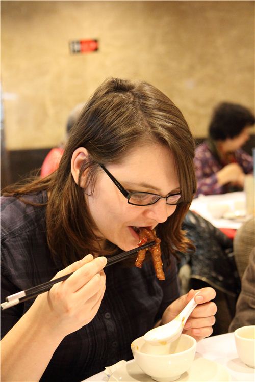 Bianca kept her promise and tries chicken feet - yummy