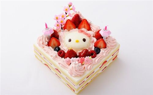 Adorable Hello Kitty cherry blossom strawberry cake.
