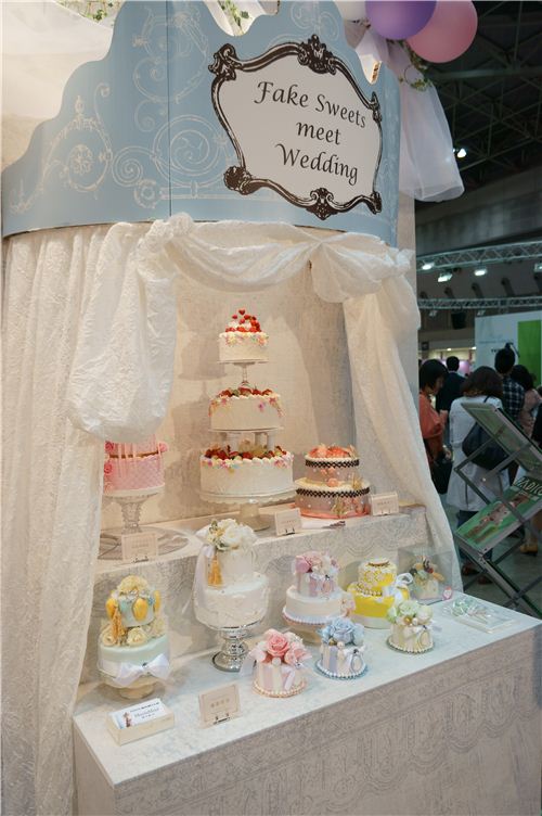 It looks like a cake buffet at a wedding